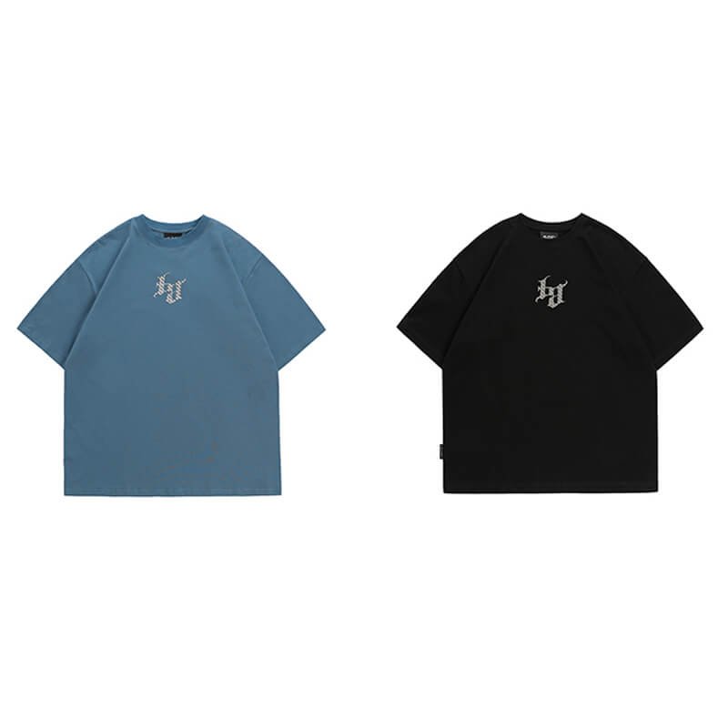 Two oversized short-sleeve t-shirts, one blue and one black, with embroidered logos.