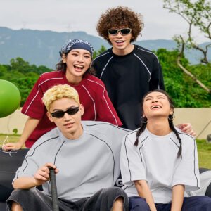 Group of four friends wearing casual raglan sleeve t-shirts