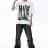 Custom Abstract Letter Graphic Streetwear T-Shirt - Style 97E0AD White oversized t-shirt with abstract black print and 'MADE ENTIRE' text