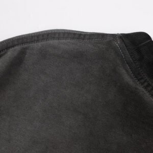 Close-up of a dark acid-wash crop t-shirt neckline
