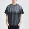 Man wearing an acid-wash gradient oversized t-shirt