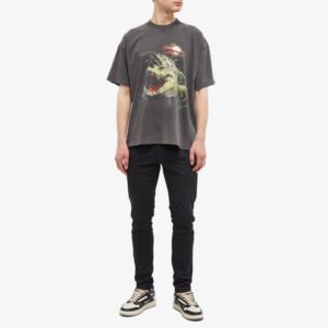 Acid wash oversized t-shirt with a graphic print of a dinosaur.