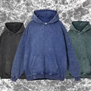 Three acid-wash pullover hoodies in charcoal, blue, and green.