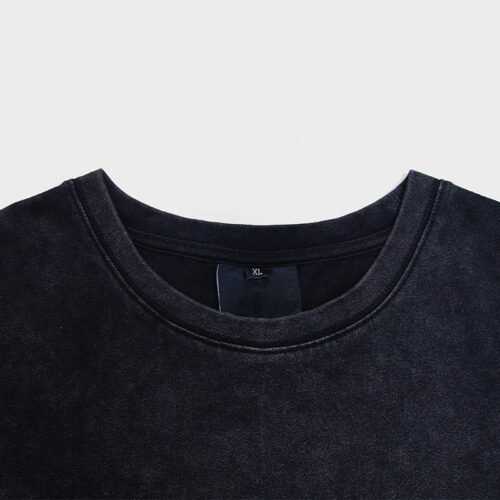 Custom Acid-Wash Screen Print T-Shirt - Style E422DB Close-up of the neckline of an acid-washed black t-shirt