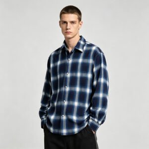 Man wearing a blue and white plaid long sleeve button-up shirt