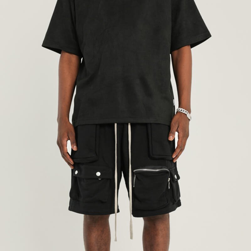 Men's black multi-pocket cargo shorts with zipper details