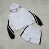Light gray cropped hoodie with black and white striped sleeves paired with matching shorts.