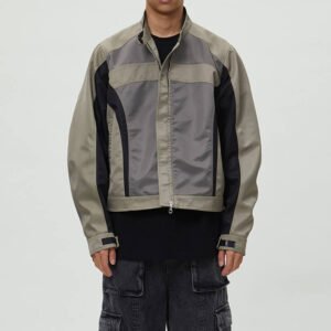 Colorblocked moto jacket in grey, khaki, and black with a stand collar