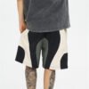 Man wearing custom colorblocked polyamide panel shorts