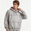 Custom Contrast-Stitch Oversized Pullover Hoodie - Style 9E41B1 Man wearing a grey oversized pullover hoodie with contrast stitching