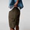 Olive green corded utility shorts with pinstripe pattern
