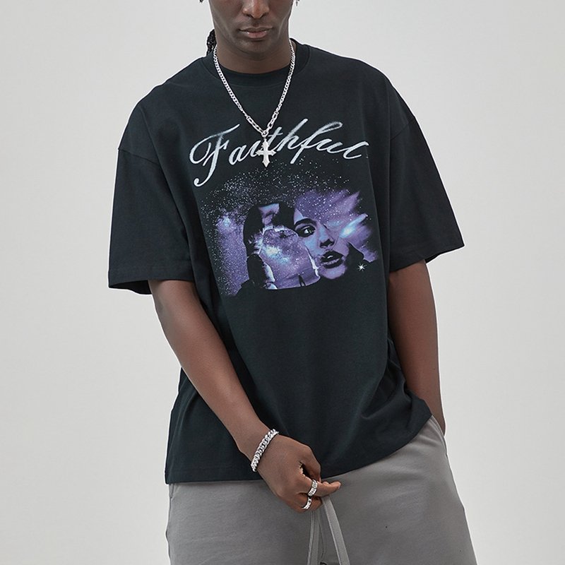 Black oversized t-shirt with a graphic of a woman's face and a galaxy, with the word 'Faithful'.