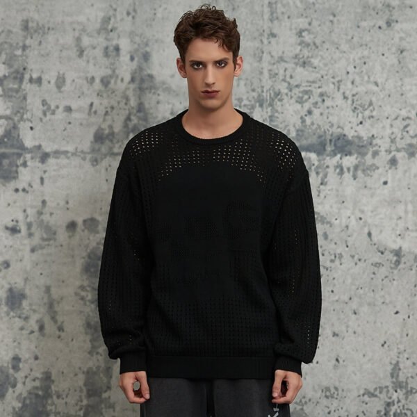 Black open-knit crewneck sweater with skull motif