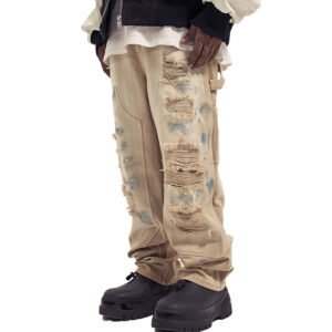 Beige distressed graffiti-wash wide-leg denim jeans with rips