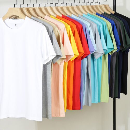 Custom Seam-Cleared Distressed Cotton T-Shirt - VW-E15F - Style E15F07 Row of plain cotton t-shirts in various colors hanging on a rack.
