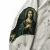Custom Distressed Graphic Long-Sleeve T-Shirt - Style 1F9B7F Distressed long-sleeve t-shirt with a religious art patch