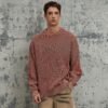 Pink distressed ribbed knit sweater