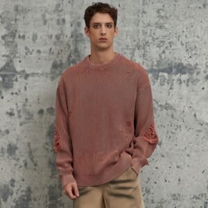 Pink distressed ribbed knit sweater