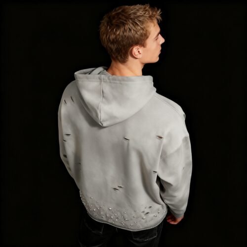 Custom Distressed Rhinestone Acid-Wash Pullover Hoodie - Style 69793D Man wearing a grey distressed acid wash pullover hoodie with rhinestones
