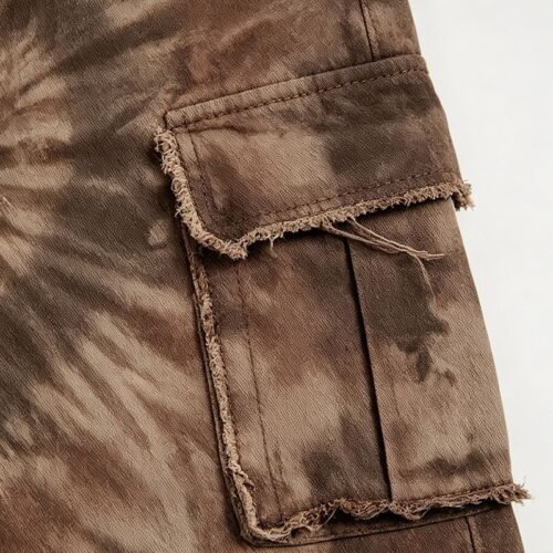 Custom Distressed Utility Vintage Pants 713-03 - Style 6371AC Close-up of brown tie-dye cargo pants with frayed pocket details