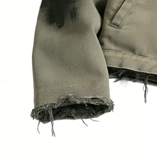 Custom Washed Distressed Workwear Jacket - Style D154E5 Close-up of a distressed workwear jacket sleeve with raw hem