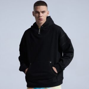 Black half-zip drawcord-free hoodie with colorful contrast stitching