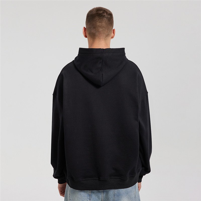 Back view of a plain black oversized drawstring-free hoodie