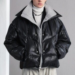 Man wearing a black faux two-piece mock-neck puffer jacket