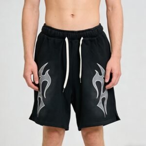 Man wearing custom flame graphic drawstring streetwear shorts