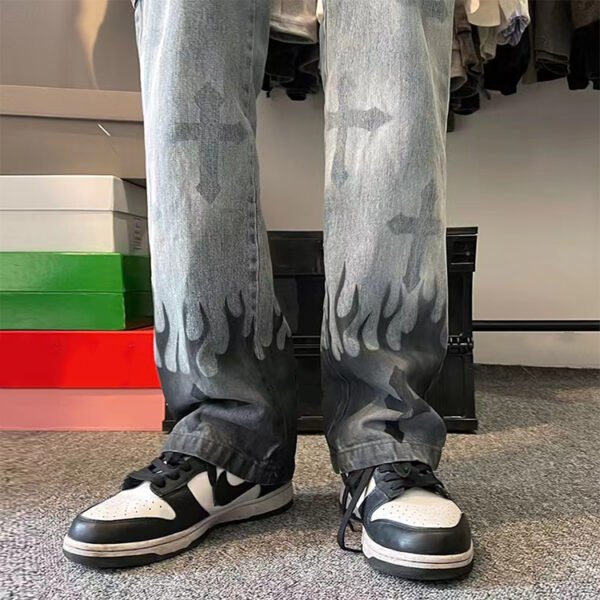 Custom Washed Flame-Hem Loose Straight Jeans - Style DFCFCA Washed loose straight jeans with flame and cross graphics
