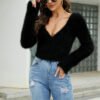 Custom Women's Fuzzy V-Neck Cropped Sweater - Style 95F24E Woman wearing black fuzzy v-neck cropped sweater