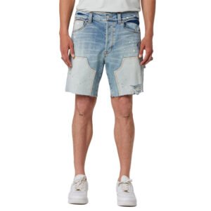 Light wash distressed denim cargo shorts with raw hems and paint splatter