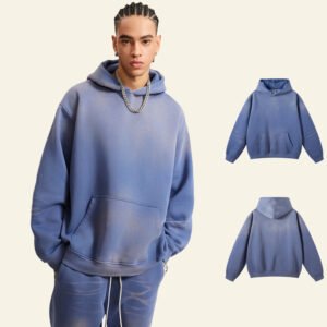 Man wearing a blue gradient washed oversized pullover hoodie