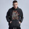 Man wearing a washed black graphic hoodie with skeletons on fire