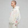 Off-white hoodie with colorful hand-drawn line graphics