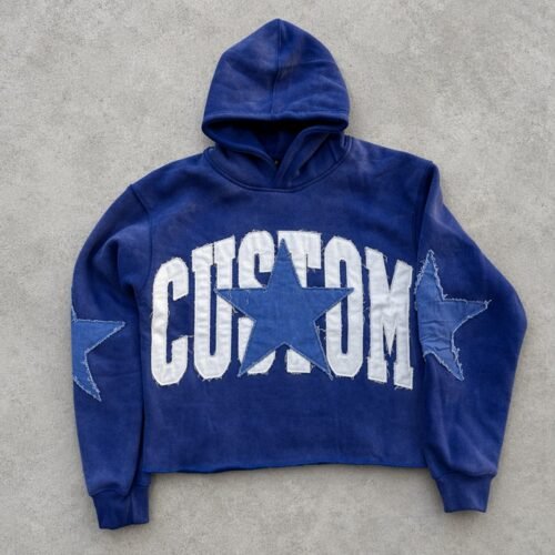 Blue washed cropped hoodie with custom star applique