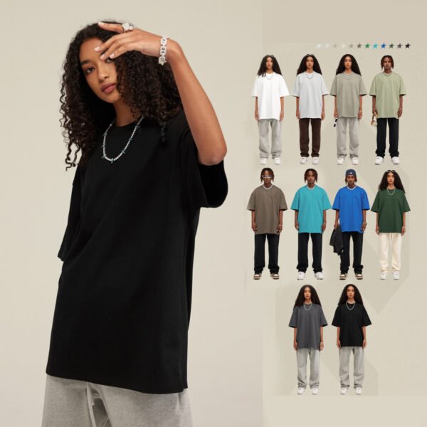 Woman wearing a black oversized drop-shoulder t-shirt, with other models in various colors.
