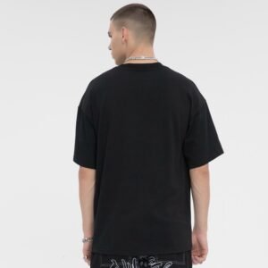 Back of a black oversized t-shirt