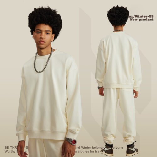 Custom Heavyweight Oversized Terry Sweatshirt W0175 - Style 6B548B Man wearing a cream oversized cotton terry sweatshirt and matching sweatpants