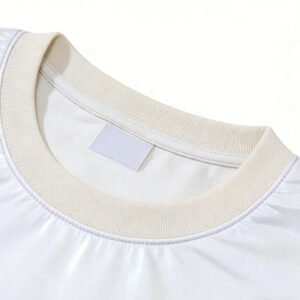 Close-up of a white holographic print streetwear t-shirt neckline