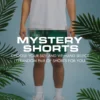 Man wearing mystery graphic shorts with text overlay.