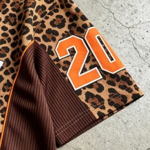 Oversized polo shirt with leopard print and orange number 20 applique