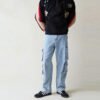 Man wearing custom light blue multi-pocket utility pants