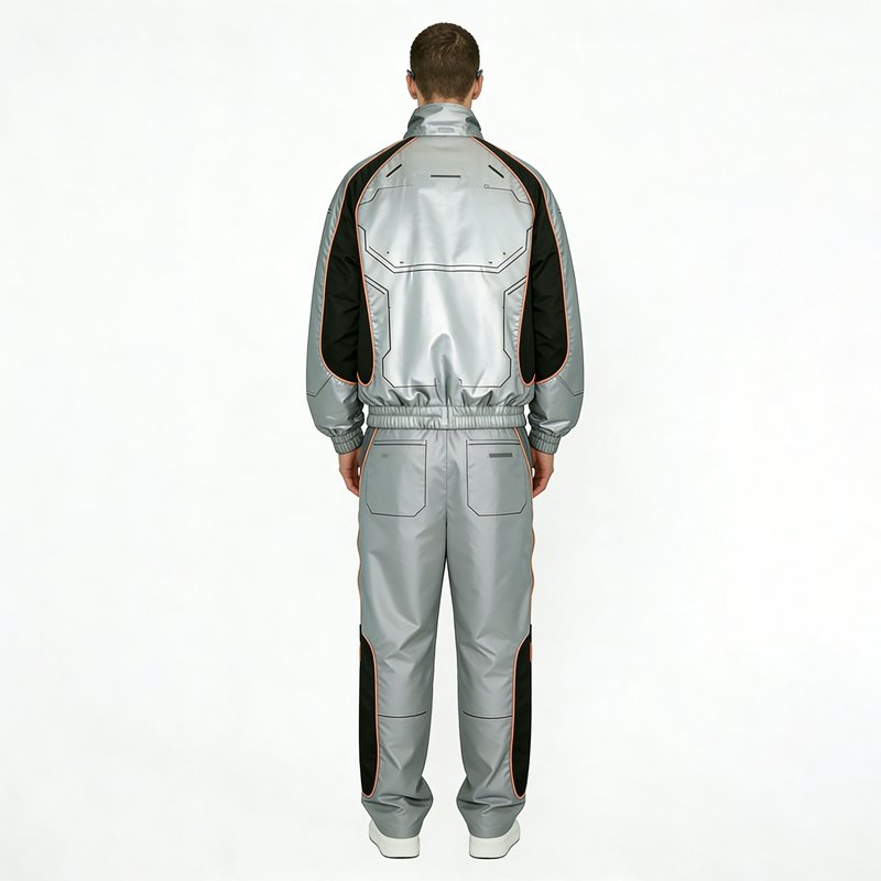 Silver metallic panel track jacket with black and orange accents