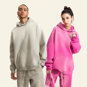 Couple wearing oversized drop-shoulder pullover hoodies