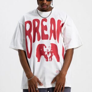 White oversized graphic t-shirt with red 'BREAK' text and graphic
