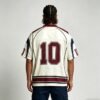 Custom Oversized Mesh Panel Number Jersey - Style 6BEF09 Man wearing an oversized white mesh jersey with maroon and navy accents and the number 10.