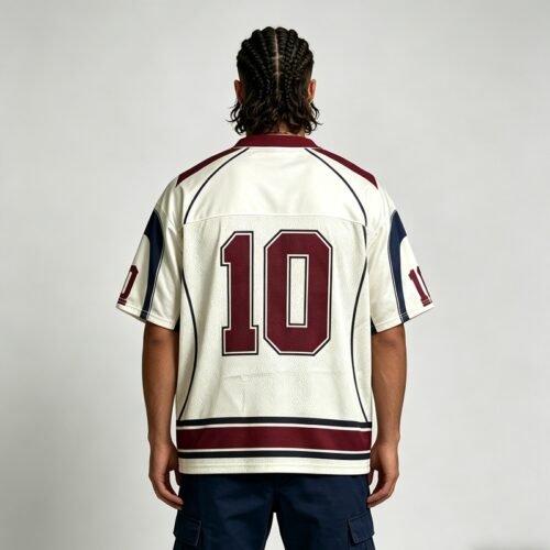 Custom Oversized Mesh Panel Number Jersey - Style 6BEF09 Man wearing an oversized white mesh jersey with maroon and navy accents and the number 10.