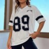 White oversized jersey with 'New York' text and number 89 graphic