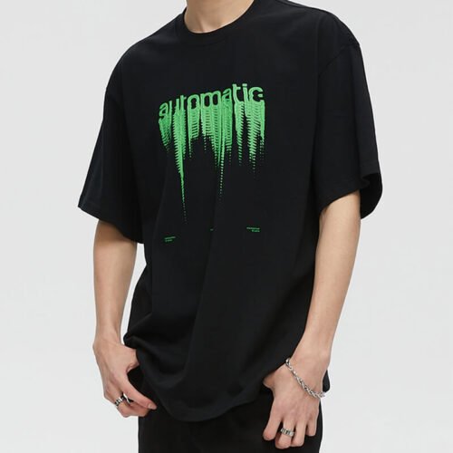 Black t-shirt with green puff print graphic and 'automatic' text